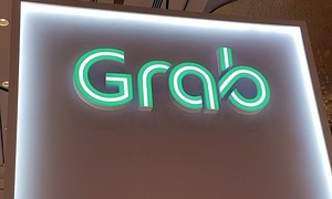 Grab phải hạ nhiều mục tiêu vì Covid-19. Ảnh: Reuters